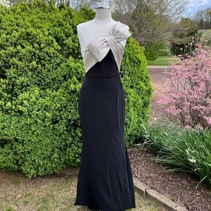 Theia Black one shoulder long gown. Silver/champagne bow. Mother of Bride/Groom.